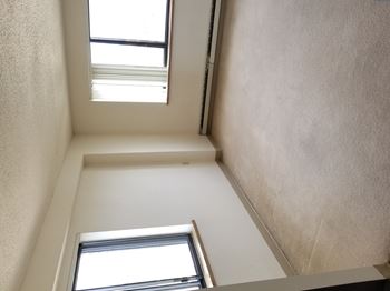 One bedroom corner apartment windows